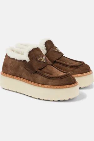 Prada Plateau-Loafers aus Veloursleder mit Shearling