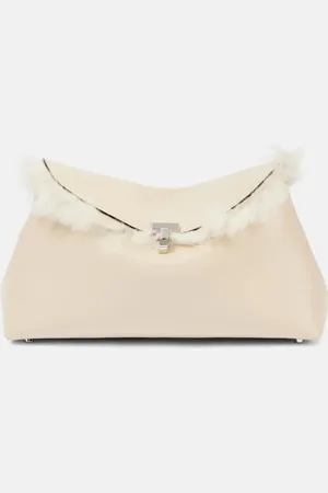 Totême Clutch T-Lock aus Leder mit Shearling
