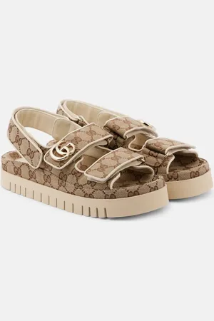Gucci Plateausandalen New Marmont GG mit Leder