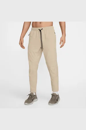 Nike UnlimitedVielseitige Dri-FIT Hose mit Reißverschluss am Bündchen für Herren