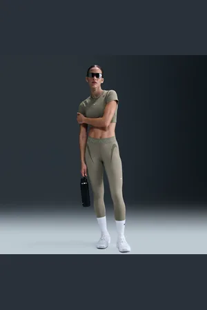 Nike Pro 7/8-Tights mit mittelhohem Bund und Grafik für Damen