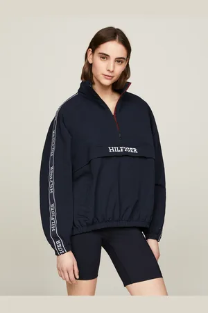 Tommy Hilfiger Outdoorjacke »MONOTYPE TAPE RLX 1/2 ZIP JACKET«, mit Logo-Tape