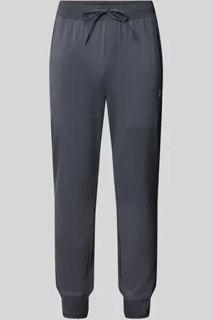 Under Armour Regular Fit Sweatpants mit Reißverschlusstaschen Modell 