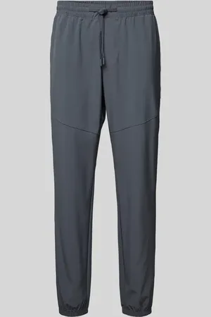 Under Armour Relaxed Fit Trainingshose mit Label-Print Modell 