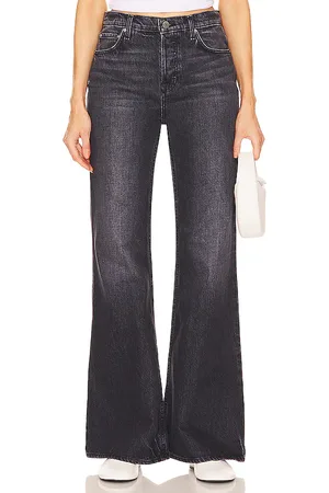 GRLFRND JEANS JADE LOW RISE RELAXED FLARE in . Size 27, 28, 29, 30, 31, 32.
