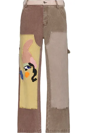 KIDSUPER STUDIOS HOSE MIT KNIE-PATCHES PATCHWORK FACE in . Size M, S, XL.