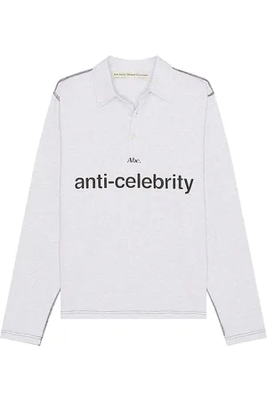 ADVISORY BOARD CRYSTALS POLOHEMD in . Size M, S, XL/1X.