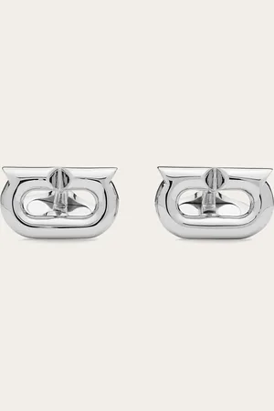 Salvatore Ferragamo Manschettenknöpfe aus palladiumfarbenem Messing, mit frontalem Element, das durch die neue Gancini-Silhouette geprägt ist, die ein wenig länglicher und graphischer ist