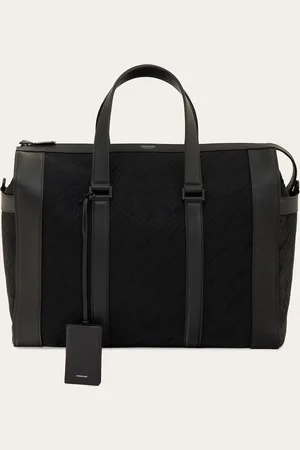 Salvatore Ferragamo Groß, geräumig, perfekt für die Reise: bietet eine extra große Reisetasche aus Jacquardgewebe mit Logo-Dessin und Details aus Kalbsleder in halbmatter Ausführung