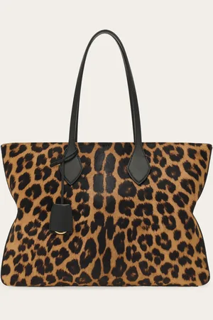 Salvatore Ferragamo Großstadt-Glamour und bissiger Charakter definieren diese Variante der Tragetasche von aus Ponyfell mit Animalier-Dessin