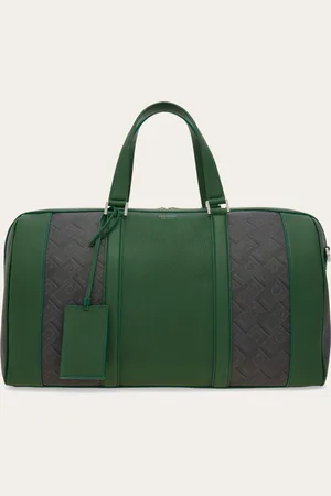 Salvatore Ferragamo Die Reisetasche ist ideal für Wochenendausflüge oder Geschäftsreisen und wird hier aus Funktionsgewebe, verziert mit dem -Monogram-Dessin und mit Details aus geschmeidigem Kalbsleder in Kontrastfarbe mit edlem Farbblock-Effekt angeboten