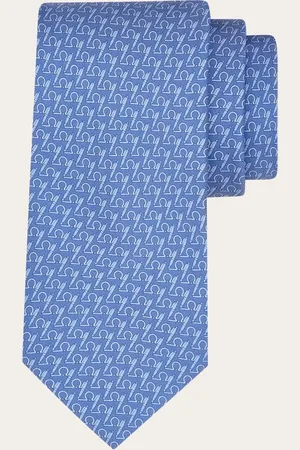 Salvatore Ferragamo Diese eigens für die Fans der Kunst des Schreibens konzipierte Krawatte aus reiner Seide ist mit einem Kontrast-Print auf Vorder- und Rückseite verziert: auf einer Seite ein Dessin aus mit einer Feder gezeichneten Gancini-Elementen