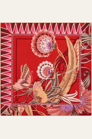 Salvatore Ferragamo Two heritage patterns fuse together to create this unique silk scarf: butterflies and flowers dance in a motif outlined by geometric elements on one side and sinuous shapes with foliage on the other