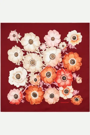 Salvatore Ferragamo The Anemone print, a floral archive pattern, is introduced with new proportions and a play of contrasting colors for a romantically hearted motif